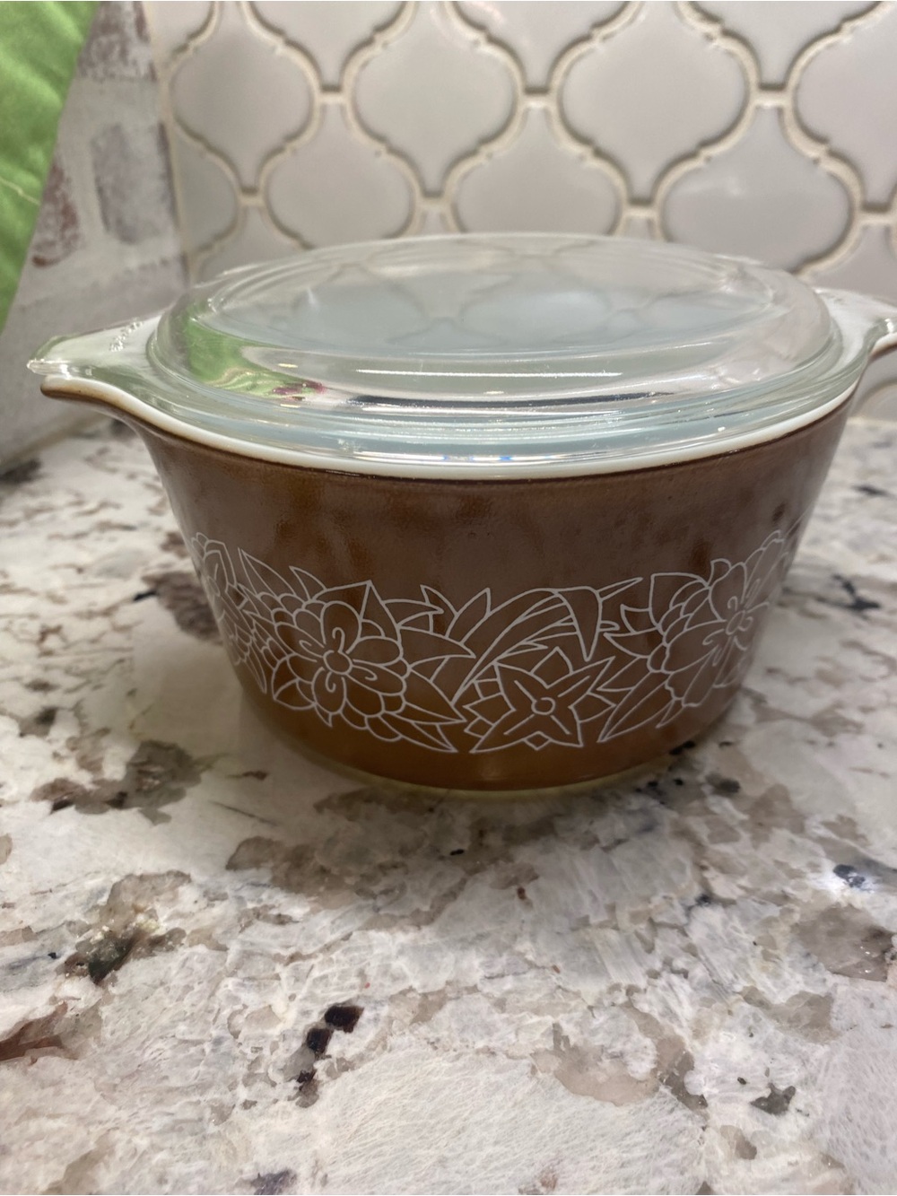 Vintage Pyrex Woodland pattern round casserole dish with its clear glass lid.